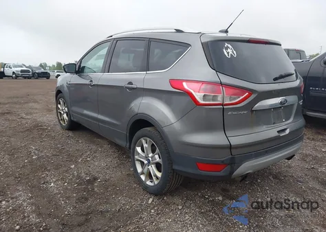 2014 Ford Escape Titanium z USA, uszkodzony, nr VIN 1FMCU9J94EUD53193